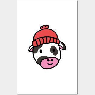 Cute cartoon dairy cow wearing a wooly hat Posters and Art